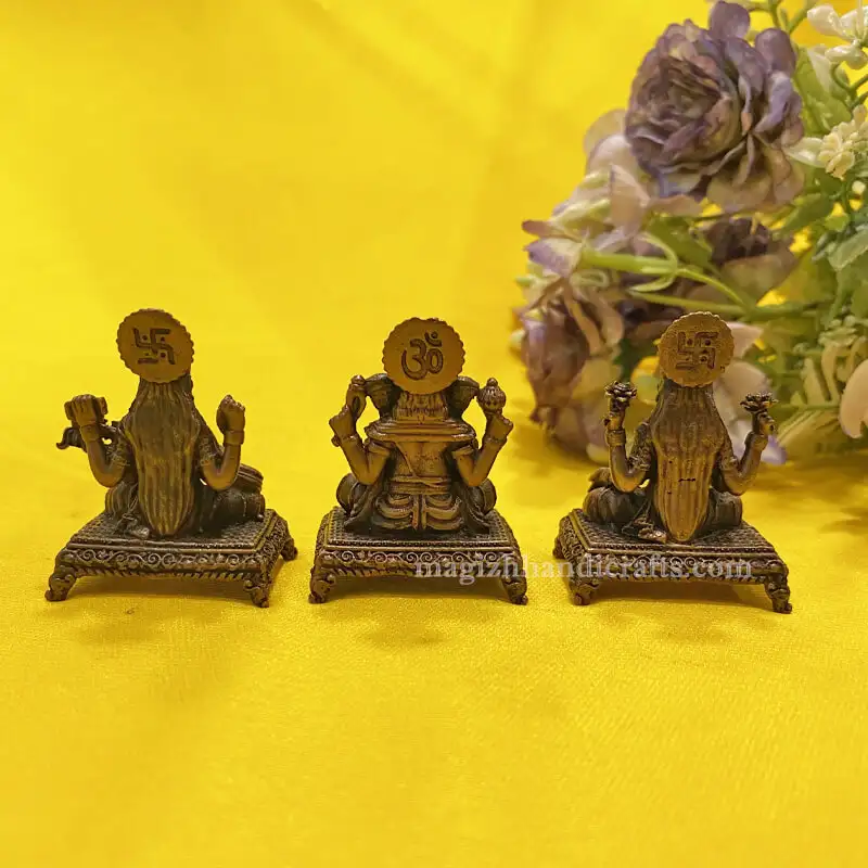 Copper Ganesha Lakshmi Saraswathi idol 2 inch - image 1